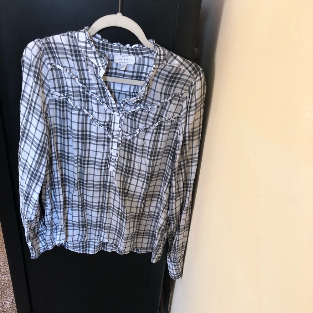 Long sleeve plaid blouse with ruffle detail